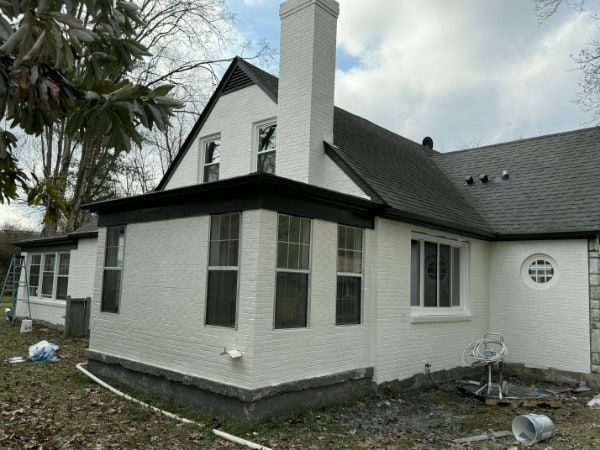 Corner and edge detail on a painted home exterior.