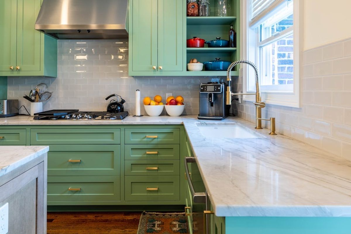 Kitchen cabinet and tile backsplash detail.